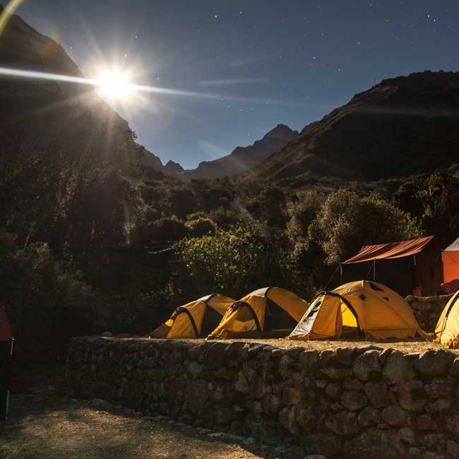 the sunrise at a camp in pacaymayo