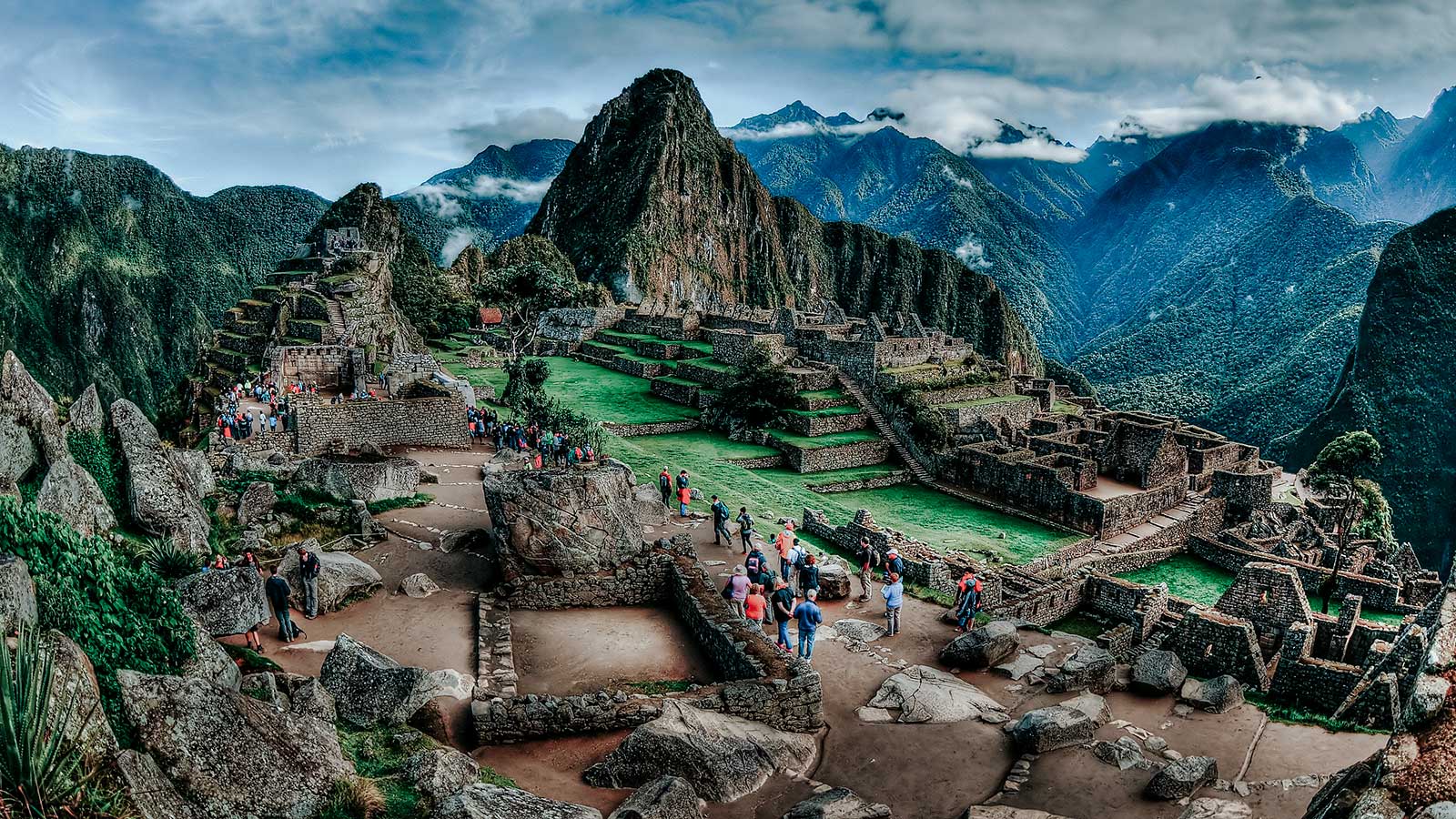tourists in machu picchu citadel 